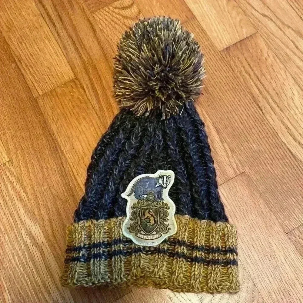 Harry Potter Hufflepuff Knit Beanie With PomPom in Size Youth.  Gray and Yellow.